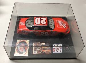 lot 1084 image: Tony Stewart Diecast 124 #20 Home Depot Orange Car in Display Case with Extras
