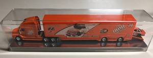 lot 1086 image: New In Display Case Tony Stewart #20 Home Depot 164 Scale Tractor Trailer Truck with Car