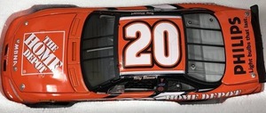 lot 1132 image: New In Box Tony Stewart #20 Diecast Orange Car Home Depot 124 Scale 2002 Grand Prix