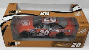 lot 1134 image: New In Box Tony Stewart #20 Diecast Orange Car 124 Scale