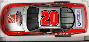 lot 1135 image: New In Box Tony Stewart #20 Diecast Silver Car 124 Scale 2003 Monte Carlo