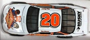 lot 1137 image: New In Box Tony Stewart #20 Diecast WhiteOrange Car 124 Scale 2000 Grand Prix Kids Workshop