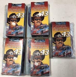 lot 1194 image: Five Richard Petty VHS Cassette Tapes with Matchbox Race Car