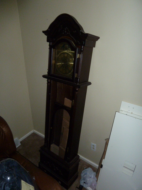 lot 316 image: GRANDFATHER CLOCK.  GLASS PANEL IS BROKEN.  HINGES ON THAT DOOR ARE BENT.