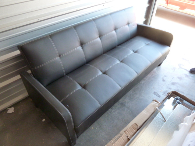lot 445 image: VERY NICE BLACK FUTON...has one small cutflaw in it...see pictures