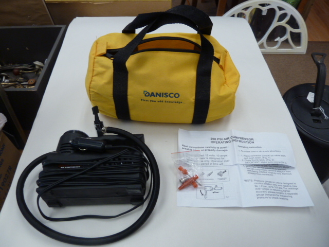 lot 608 image: 260 PSI AIR COMPRESSOR with needles & carrying case