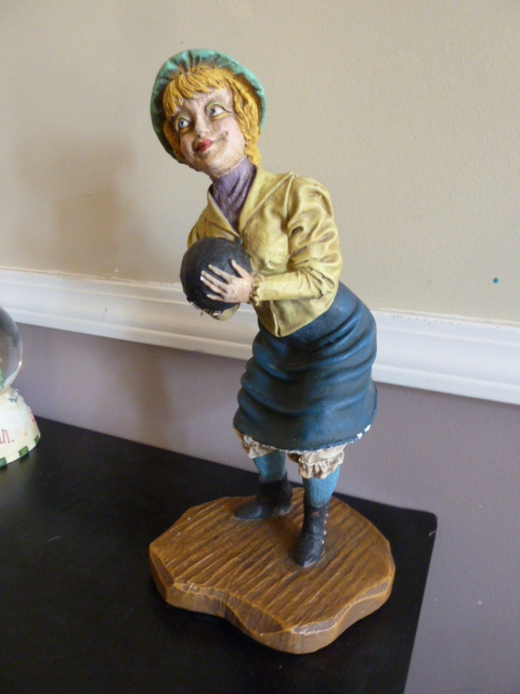 lot 652 image: 12 Statue of a woman bowling