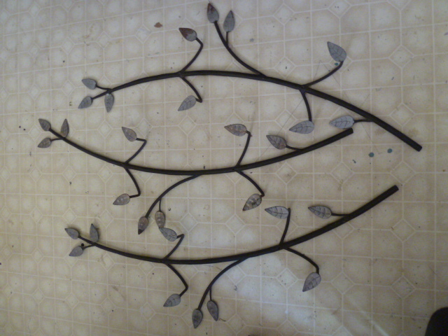 lot 684 image: 3 IRON PLATE HOLDERS with leafs design...about 40 tall each...very heavy