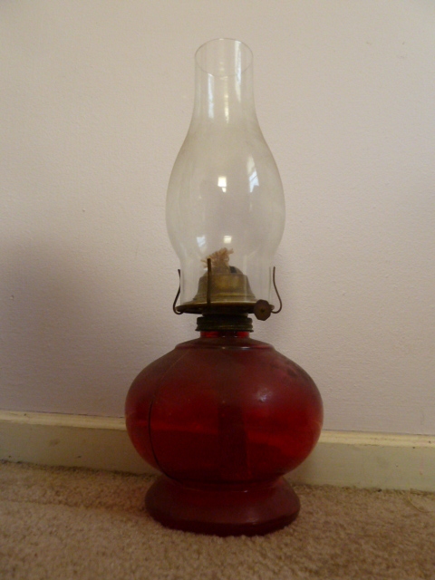 lot 238 image: VERY COOL OIL LAMP WITH RED BASE