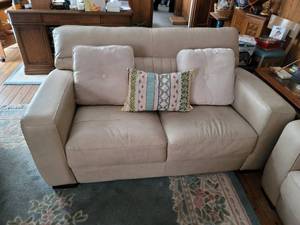 lot 101 image: Genuine Leather Loveseat - No Rips No Tares