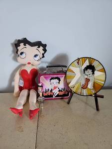 lot 2193 image: Betty Boop Collectible Lot (Plush Doll, Lunch Box, Wine Cork, Stained Glass )