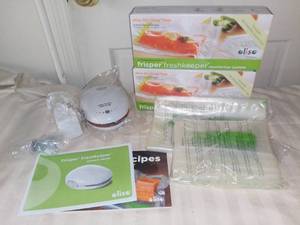 lot 9005 image: Unopened Oliso Crisper Freshkeeper Vacuum Sealer With Extra Bags