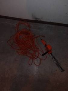 lot 9049 image: Heavy Duty Extension Cord and Black and Decker Hedge Trimmer