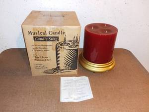 lot 8035 image: Musical Candle Plays My Heart Will Go On