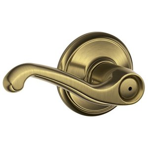 lot 88781 image: Schlage F40FLA609 Flair Privacy Lever, Antique Brass