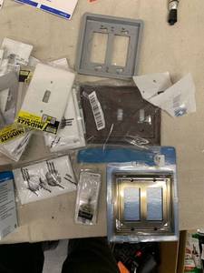 lot 2076 image: box of outlets, outlet covers and switches