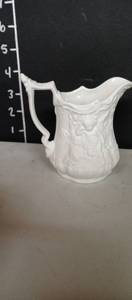 lot 1004 image: Portmeirion Parian England bisque creamer