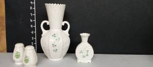 lot 1007 image: Belleek shamrock vases with salt and pepper shakers