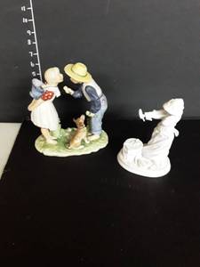 lot 1037 image: 2 Norman Rockwell Ceramic Figurines. One has a cracked bottom...see pictures