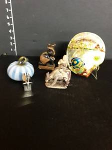 lot 1044 image: Hand carved bull with rider, KARG paperweight, Dansk gazelle and assorted decor items