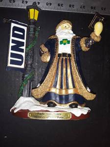 lot 1059 image: University of Notre Dame...Fight Song Santa