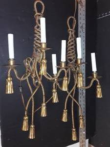 lot 1063 image: 2 Brass Rope Twisted Lamps. Hangs on wall