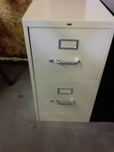 lot 1125 image: 2 drawer filing cabinet. tan in color. 29 x 15 x 25