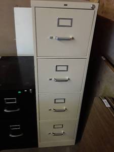 lot 1127 image: 4 drawer filing cabinet....tan in color. 52 x 15 x 25