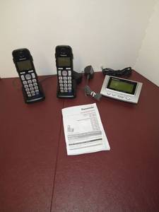 lot 1501 image: Panasonic wireless house phones with base and a Radioshack caller id