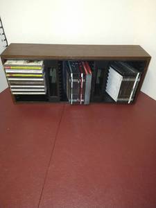 lot 1504 image: Wooden cd organizer with assorted cds
