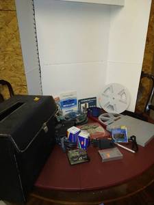 lot 1520 image: Elmo brand carrying case with reels and reel cases and more