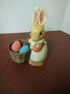 lot 1529 image: Easter bunny with basket and eggs figurine
