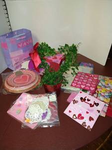 lot 1546 image: Heart shaped greenery decor in a red bucket with assorted Valentines Day items