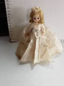 lot 2004 image: Vintage Bride Doll. Has a couple of stains on right side and at bottom