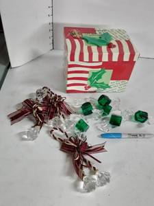 lot 2082 image: Christmas Box with green glass candies and 4 napkin rings