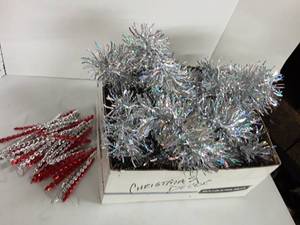 lot 2085 image: Christmas Decor. Red and silver icicles and silver garland