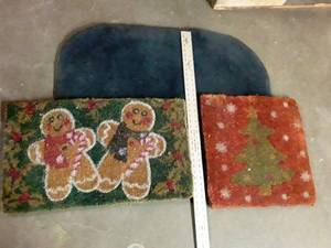 lot 2100 image: Lot of rugs. 2 are xmas and other is bathroom..