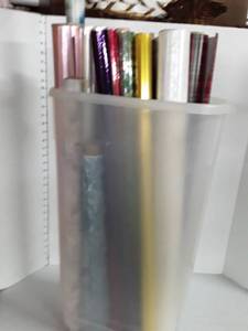 lot 2101 image: Wrapping paper..all partial rolls PLUS container