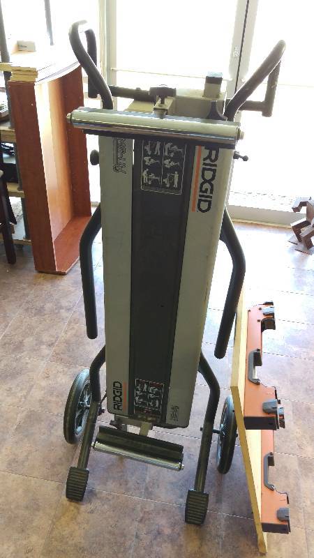 lot 17 image: Ridgid Heavy Duty Portable Miter Saw Stand