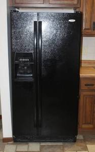 lot 8126 image: Whirlpool Black Side by Side Refrigerator Freezer 2255A - Works great