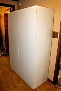 lot 8141 image: Tall and Wide White Storage Cabinet with Adjustable Shelves