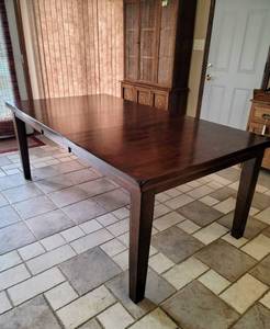 lot 8129 image: Butterfly Extension Dining Table by Ashley Furniture Collection  Ralene