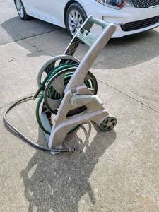 lot 8166 image: Ames ReelEasy Hose Reel Cart with hose and nozzle
