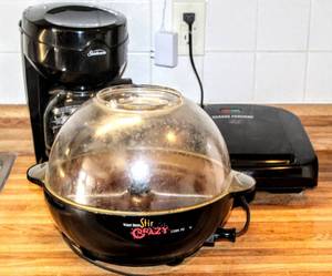 lot 8238 image: Sunbeam Coffee Maker, West Bend Stir Crazy Corn Popper  George Foreman Grill - All Powered On