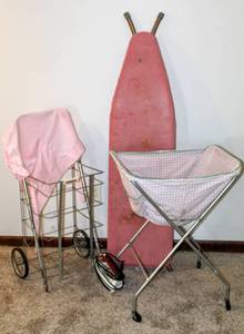lot 8308 image: Laundry Room Finds Ironing Board, Iron, Folding Laundry Cart, Folding Wheeled Basket Cart and Apron