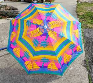 lot 8186 image: (1) Colorful Beach Umbrella  (1) Blue Chair Umbrella