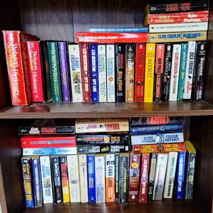 lot 8371 image: 50 Lot of Books - Clive Cussler, Dean Koontz, Jean M. Auel, Robert Ludlum, Dick Francis, Tom Clancy  more