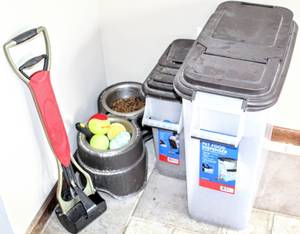 lot 8343 image: Doggie Goodies Set, Raised Bowls, (2) Pet Food Dispensers, Pooper Scooper and more