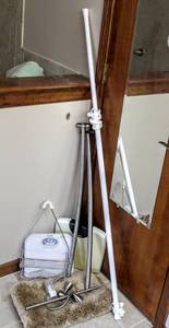 lot 8309 image: Restroom Finds Curved Shower Curtain Rod with Matching Towel Rods, Shower Caddy, Floor Rug, 2 Scales and White Straight Shower Curtain Rod