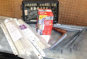 lot 8217 image: Misc. Garge Lot - Socket Set, Metal Shelving Brackets, Euro-Style Drawer Slides  Flexible Dryer Duct